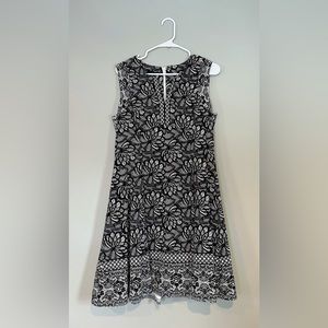 Black & white floral print, a-line, sleeveless dress. Size 10 petite.